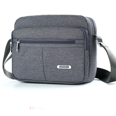 Tas Messenger Bahu Kasual Kanvas Multi Saku Gesper Polos