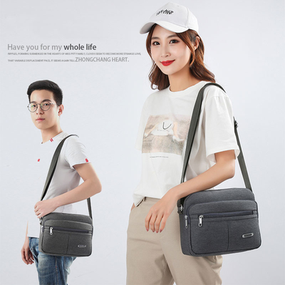 Tas Messenger Bahu Kasual Kanvas Multi Saku Gesper Polos