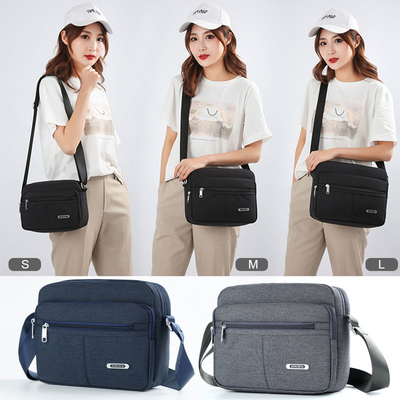 Tas Messenger Bahu Kasual Kanvas Multi Saku Gesper Polos